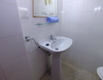 wall, indoor, plumbing fixture, bathtub, tap, bathroom, shower, bathroom accessory, toilet